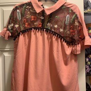 Pink short-sleeved blouse